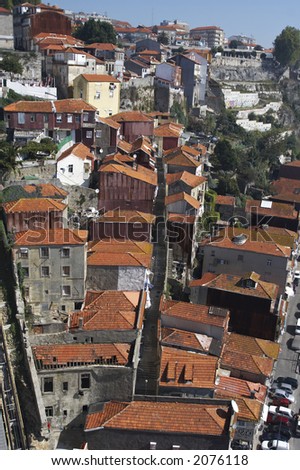 old houses with red tiled roofs on the hill