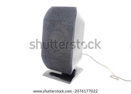Electric speaker on white background with selective focus