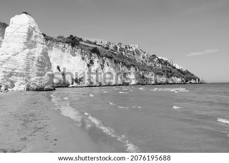 Gargano National Park in Italy - Pizzomunno Beach in Vieste. Italy black and white.