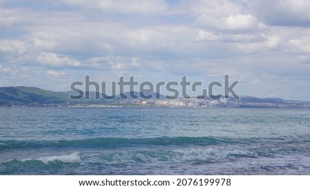 mountains sea waves ships pier blue sea sunset coast clouds spring summer wind beach sun