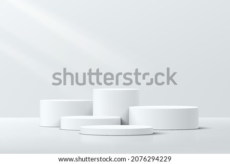 White realistic 3D cylinder steps pedestal podium set with shadow and lighting. Vector abstract studio room with geometric platform design. Gray minimal scene for products showcase, Promotion display. Royalty-Free Stock Photo #2076294229