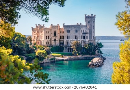 Beautiful summer view of Miramare Castle. Adorable  morning seascape of Adriatic sea. Spectacular outdoor scene of Italy, Europe. Traveling concept background.