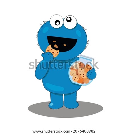 biscuit eats cookies from a glass jar Royalty-Free Stock Photo #2076408982