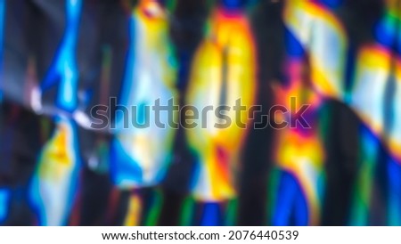 Out of focus photo lens overlays heavy grain noise abstract hologram vivid colorful texture background.
Gradient spectrum rainbow prism iridescent pattern.