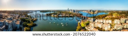 Parramatta river near Meadowbank and Rhodes on Sydney West in wide aerial panorama from city CBD to Parramatta CBD. Royalty-Free Stock Photo #2076522040