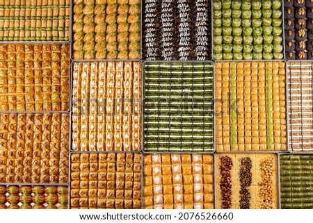 Assorted Turkish baklava. With pistachios, with chocolate, with peanuts, with coconut. 