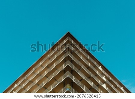 Modern Apartment Building against Clear Sky. Geometry in Architecture. Architectural Photography. Minimal Aesthetics.
