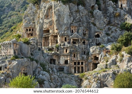 Rock-cut tombs in the lycian necropolis of Myra, Demre, Turkey Royalty-Free Stock Photo #2076544612
