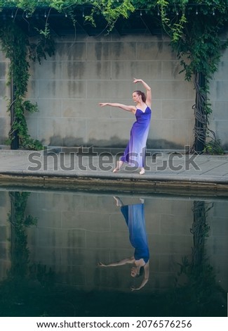 Ballet dancer in a blue dress along the Indianapolis Canal Walk