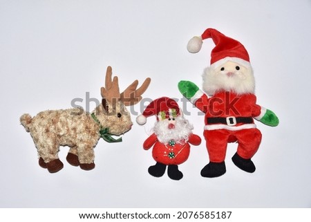 Colorful Christmas figurines isolated over white. Merry Christmas concept