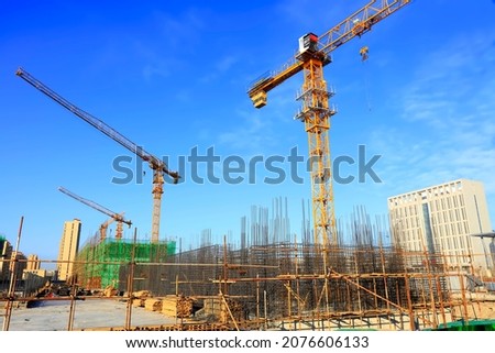 The construction site, the construction worker's tower crane, Residential buildings are under construction

