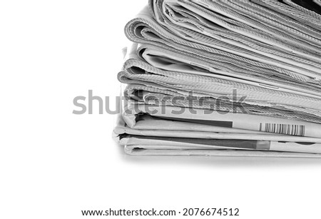 pile of newspaper with white background no people stock photo 