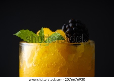 Frozen tequila based cocktail with mango. Selective focus. Shallow depth of field.
