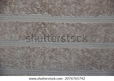 Grey woolen fabric. The texture of the fabric. Backgrounds