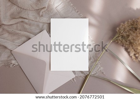 White card with envelope and cane