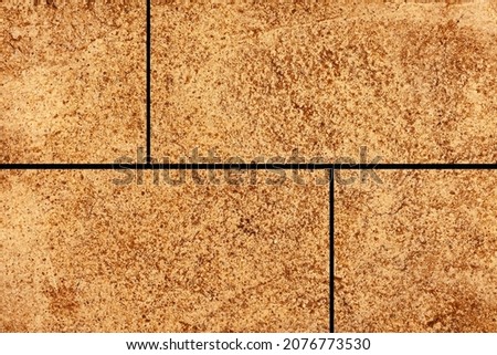 Brown granite tiled floor with vintage pattern texture and background seamless