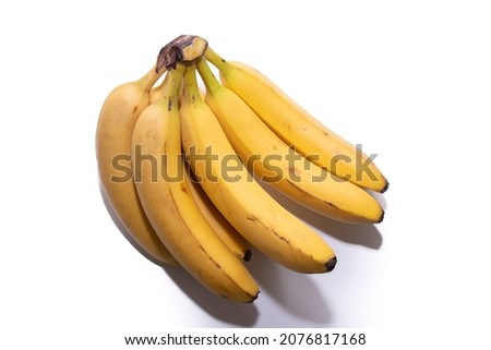 Bunch of bananas with their black spots, natural and without photoshop. Isolated on white background.