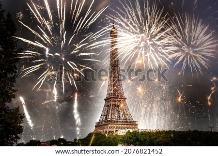 fireworks over the Eiffel tower New Year in Paris