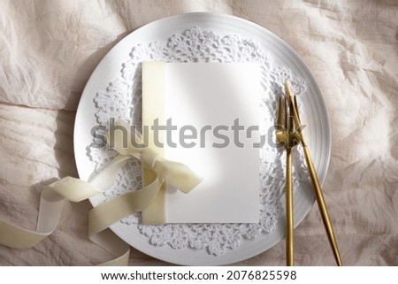 Wedding mockup card with gold cutlery