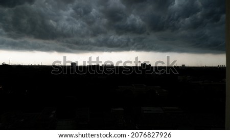 the appearance of dark clouds overcast in the afternoon. Royalty-Free Stock Photo #2076827926