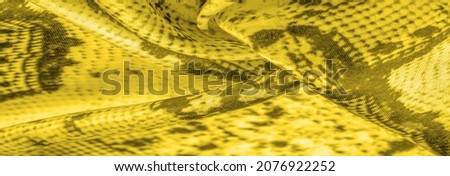 yellow fabric with a pattern of squares, background texture of bright yellow fabric close-up. background, texture, pattern,