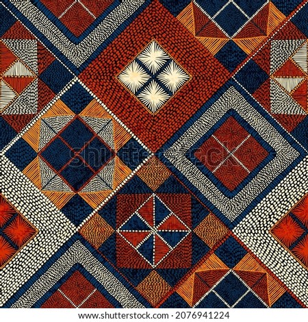 Seamless pattern in patchwork style. Embroidered print for carpet, textile, wallpaper, wrapping paper. Ethnic and tribal motifs. Handwork. Vector illustration. Royalty-Free Stock Photo #2076941224