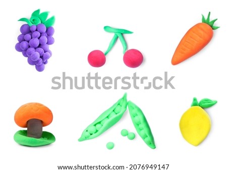 Fruits and vegetables made from playdough on white background, collage
