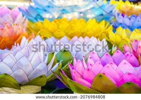 Beautiful kratongs Made of foam is floating on the water for Loy Krathong Festival or Thai New Year and river goddess worship ceremony is Public places,full moon the 12th month Be famous of Thailand.