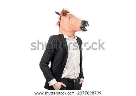 Professional hardworking man wear horse head mask with formal suit isolated on white, employee Royalty-Free Stock Photo #2077098799
