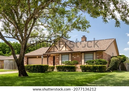 A typical ranch style house in Texas Royalty-Free Stock Photo #2077136212