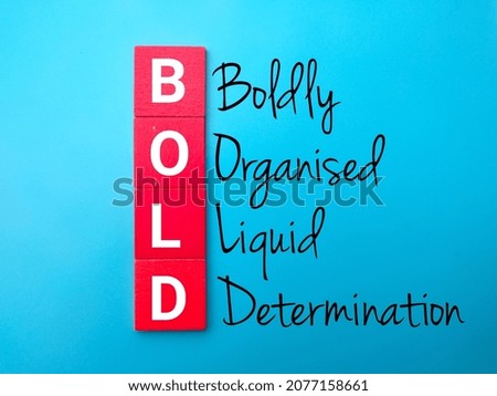 Colored cube with text BOLD (Boldly Organised Liquid Determination) on blue background.