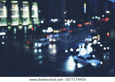 Car lights and city roads