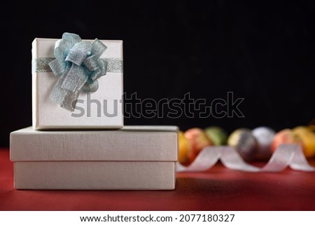Gift box on black background for christmas and new year celebration