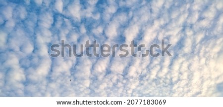 Cumulus clouds and blue sky for background Royalty-Free Stock Photo #2077183069