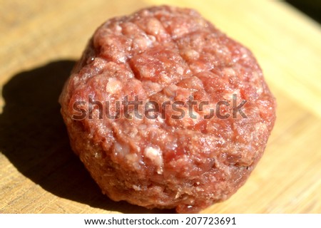 Raw meatballs fresh juicy meat on the table.