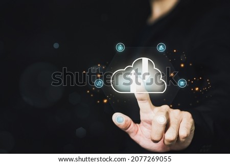 Hand touching infographic cloud computing and technology icons