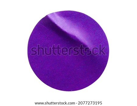 Blank purple round adhesive paper sticker label isolated on white background