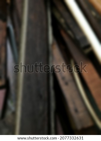 defocused abstract background of wet wood
