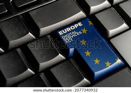 Digital services act (DSA) concept: enter key with europe flag and the text Digital Services Act Royalty-Free Stock Photo #2077340932