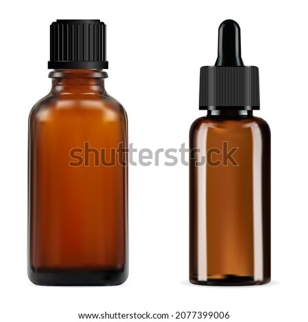 Brown essential oil bottle. Small amber glass vial with black dropper lid. Isolated glass jar with screw pipette cap. Cosmetic serum packaging mockup, clear blank Royalty-Free Stock Photo #2077399006