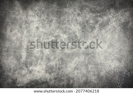 Beautiful black background with leather texture with black veins of black leather as sample of black background from natural leather or sample of texture of leather for beautiful natural background