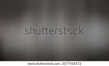 dark paper wall, Abstract and blurry black background with gradient soft white light.