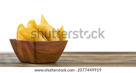 Delicious and traditional Colombian empanadas - Text space Royalty-Free Stock Photo #2077449919
