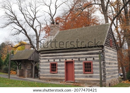 The old log cabin was built many yers ago in Doylestown, PA. Royalty-Free Stock Photo #2077470421