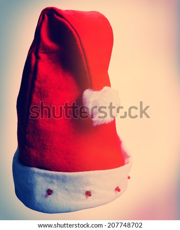 Santa Claus hat on a light background, closeup