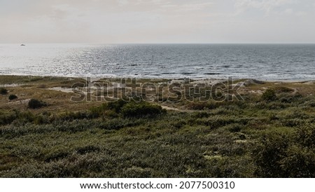 Panoramic landscape with sea at sunset