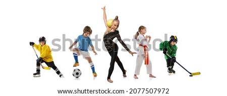 Kids sport collage. Little sportsmen. Hockey players, karate and gymnast posing isolated on white studio background. Concept of childhood, education, hobby, achievements, goals. Copy space for ad.