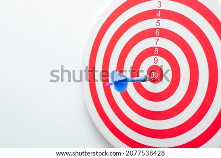 dartboard with arrow. creative concept idea for success with focus point on target to the winner in business with strategy management aim to leadership.