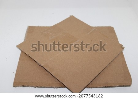 Piece of cardboard isolated on white background