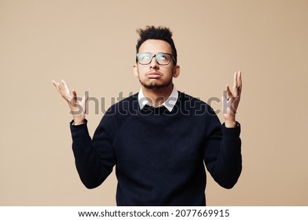 Portrait of stylish bearded man with bored fed up expression, looks displeased up, being tired to explain. Puzzled male doesnt know what to do Royalty-Free Stock Photo #2077669915